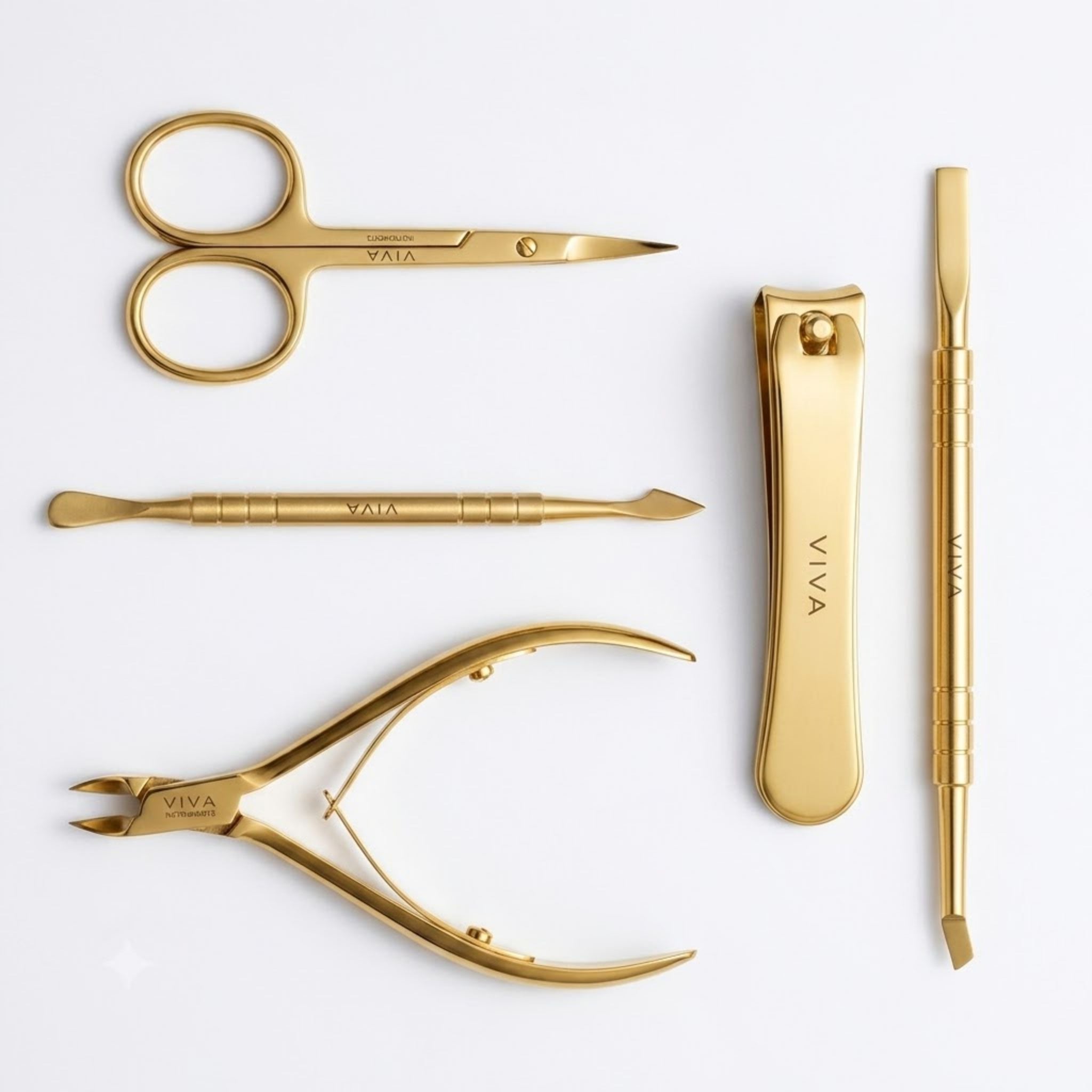 Professional Set of gold manicure nail tools with 'VIVA' branding on a white background - Viva Instruments 
