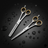 Two pairs of silver barber scissors on a black background with water droplets.