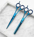 Set of blue hairdressing scissors on a marble surface - viva instruments 