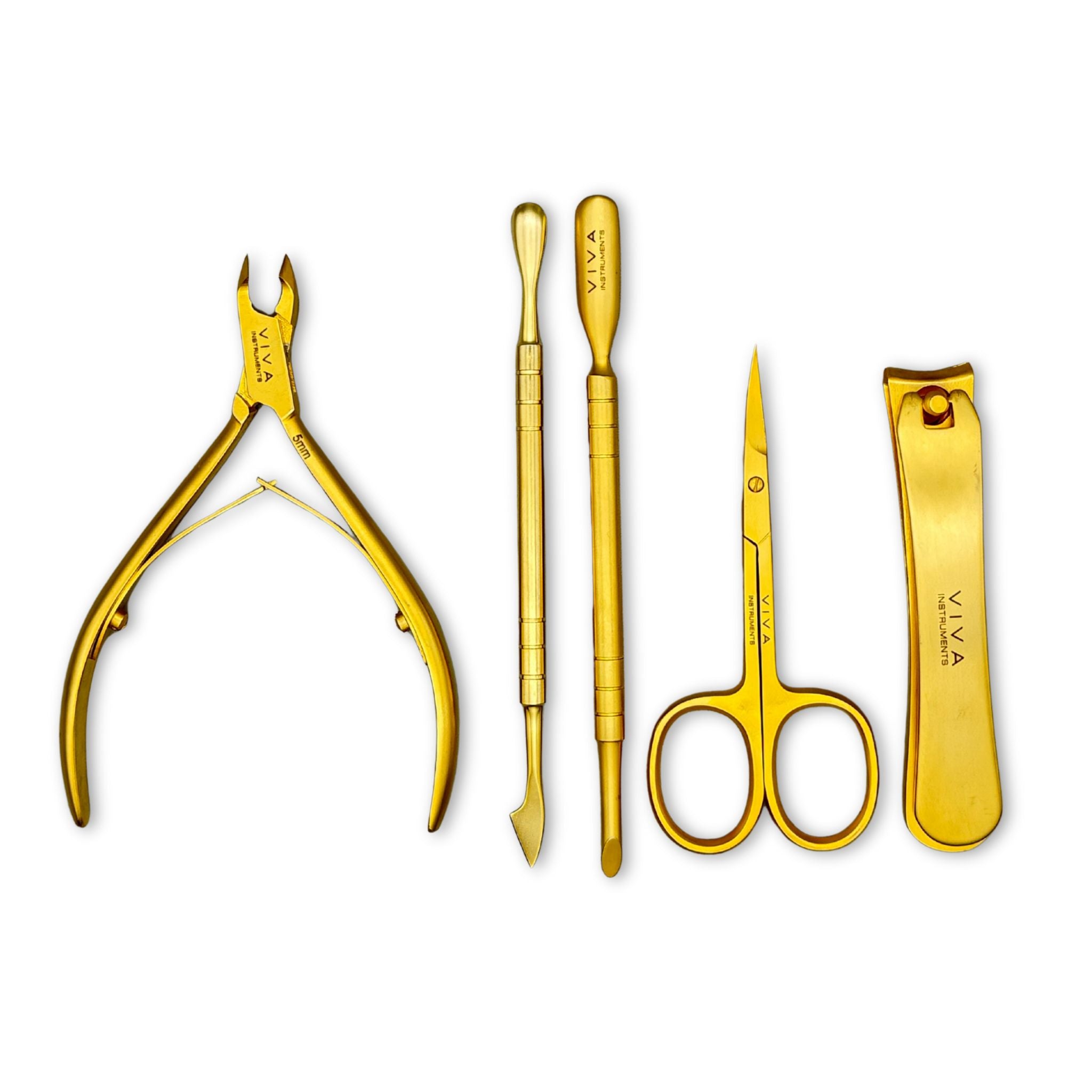 Set of gold-colored nail care tools on a white background manicure pedicure nail instruments - viva instruments