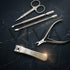 Set of professional VIVA Instruments nail care tools on a dark marble background - Viva Instruments 